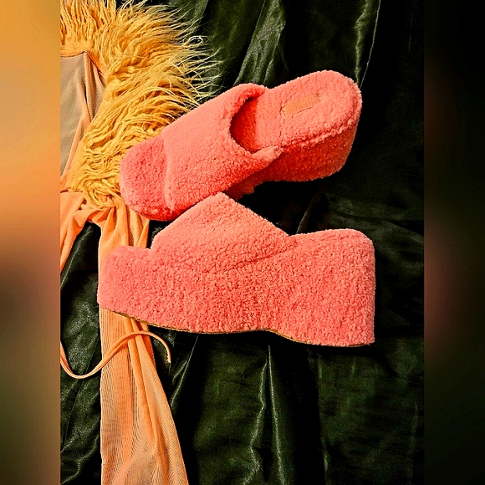 Plush pink platform slides